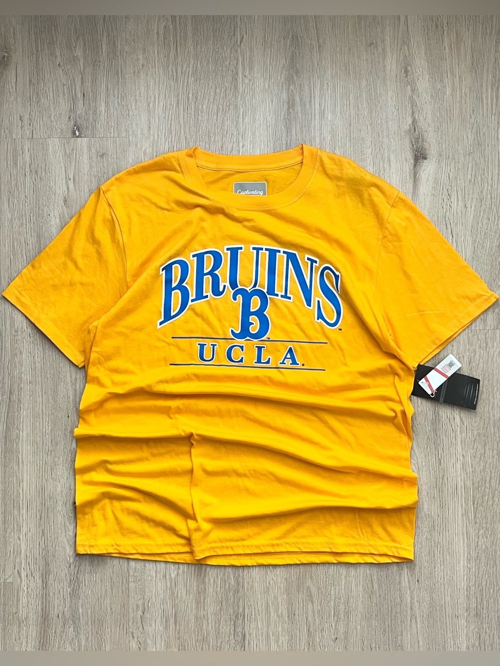 UCLA Bruins Spell Out T-Shirt Mens Large Yellow NCAA College Football Tee NWT